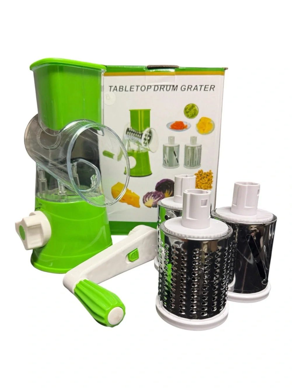 Tabletop Drummer Manual Green Vegetable Spiralizer and Grater with extra items.